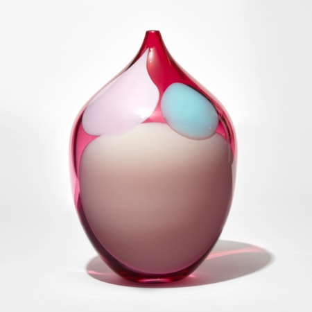 transparent rich ruby pink rounded jar with narrow neck with small opening with abstract amorphous blobs in opaque baby pink blue and soft pink hand made from glass