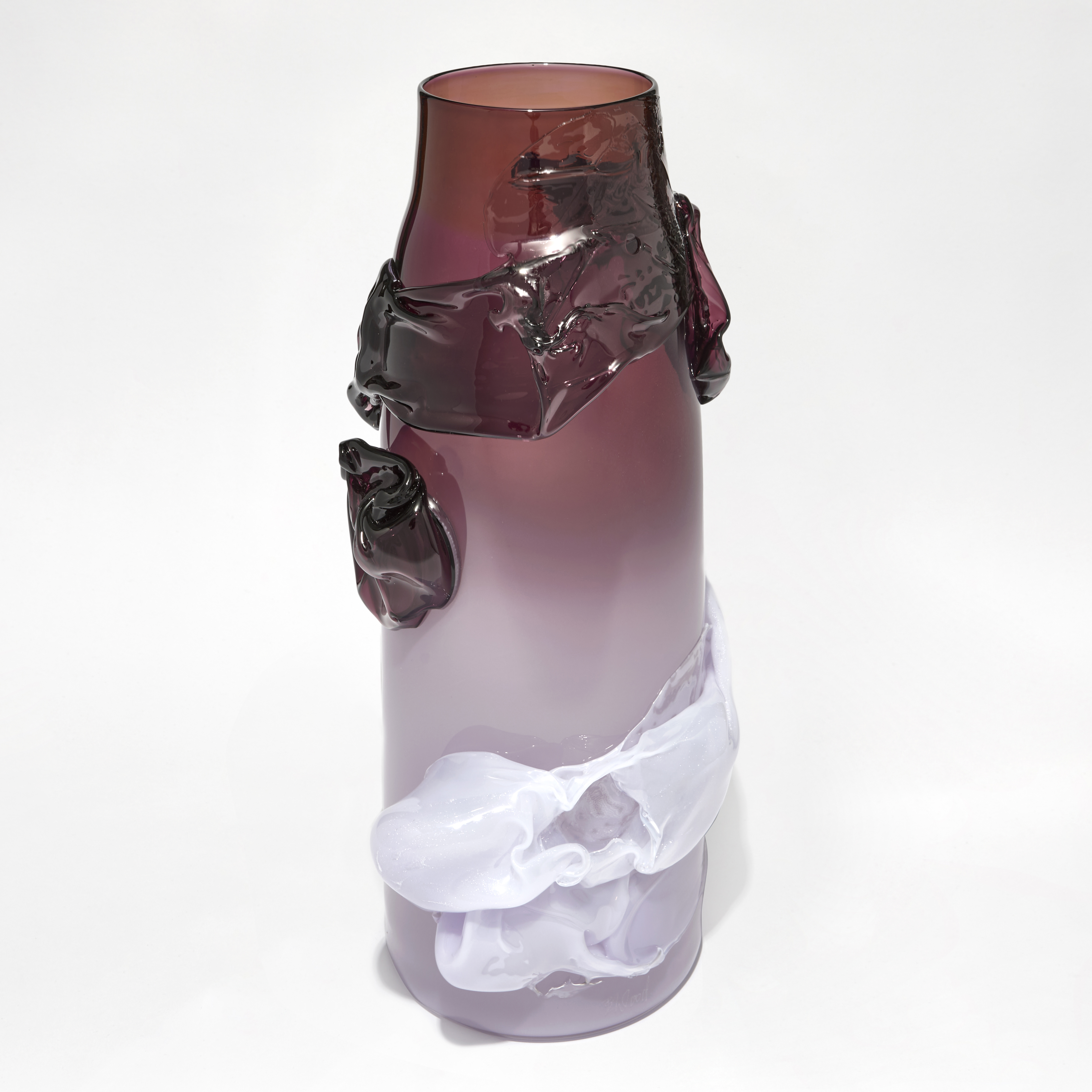 tall cylindrical vase with tapering neck with opaque lilac base blending to rich transparent dark purple aubergine with with additional surface abstract organic flourishes and textures handmade from glass