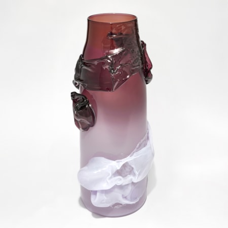 tall cylindrical vase with tapering neck with opaque lilac base blending to rich transparent dark purple aubergine with with additional surface abstract organic flourishes and textures handmade from glass