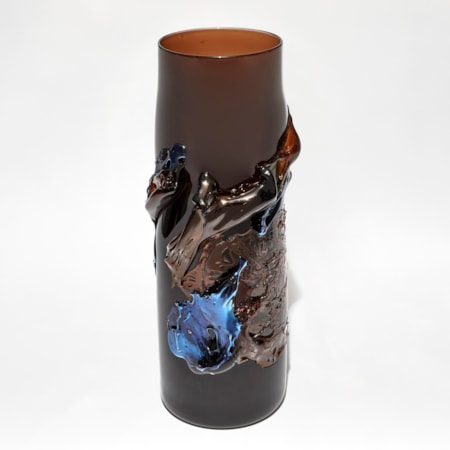 rich dark transparent amber brown vase with tapering neck with raised organic textured detail in metallic blue and brown handblown from glass