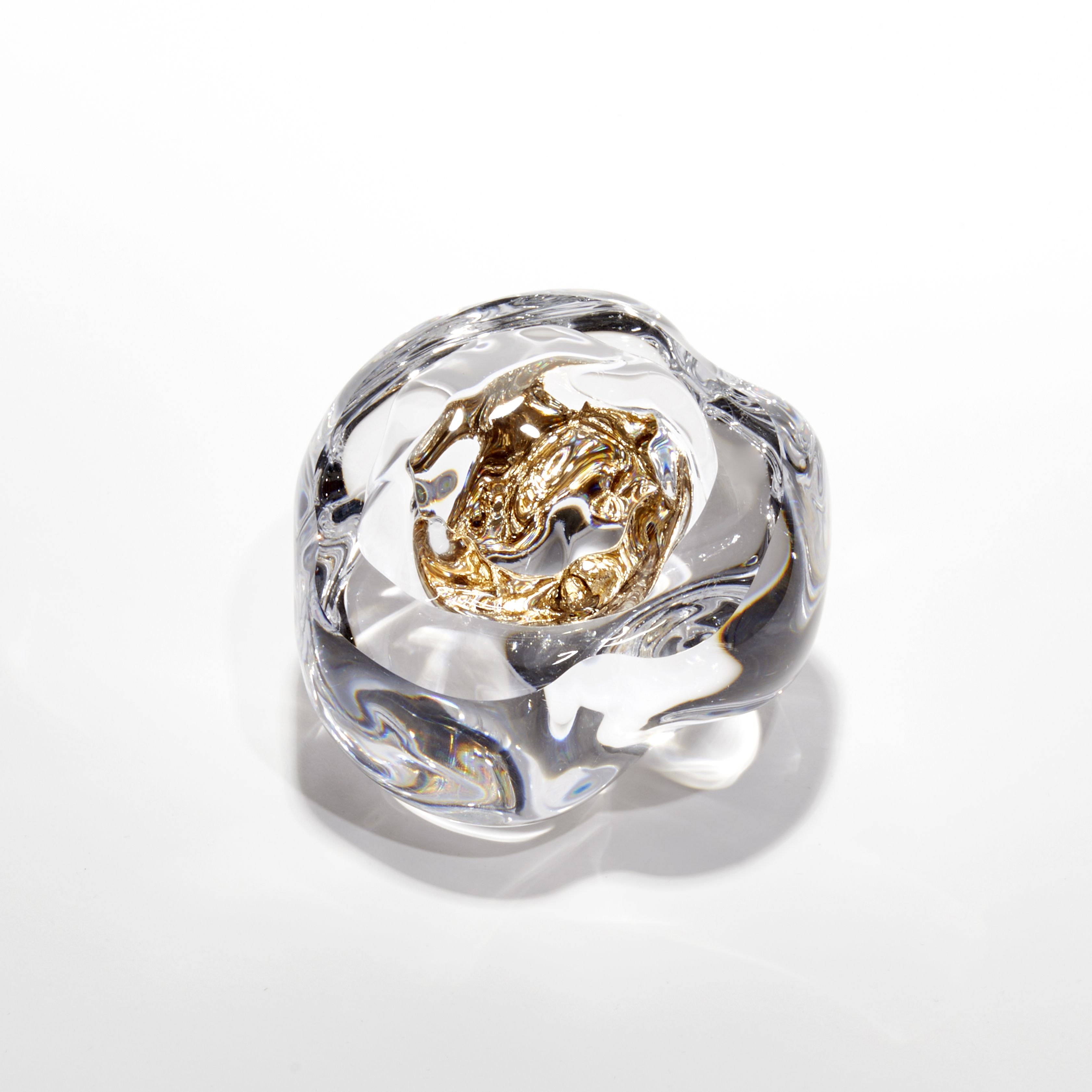 organic clear boulder with hollow centre filled with 22ct moon gold hand blown and sculpted from glass