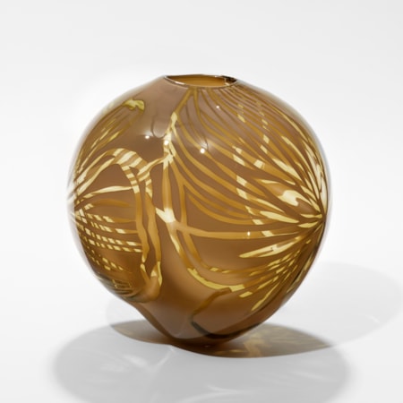 organic round vase in ochre mustard rich yellow with clear feathered see through sections hand made from glass