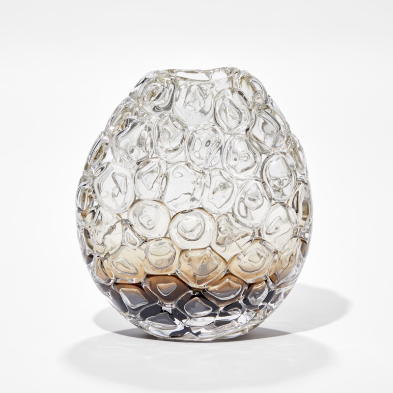 oval hand blown glass vase in clear fading to rich fawn brown at the very base covered in oversized bubbles