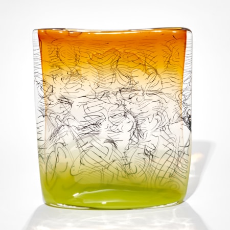 square sculpture with lime base fading to clear then ochre amber yellow with trapped black lines hand made from glass