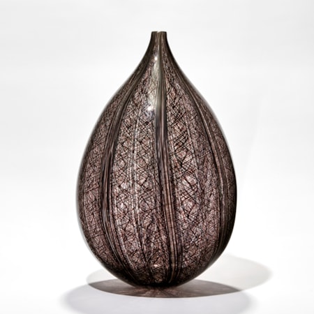 sculpted art-glass vase with wide base and narrow top with patterned exerior
