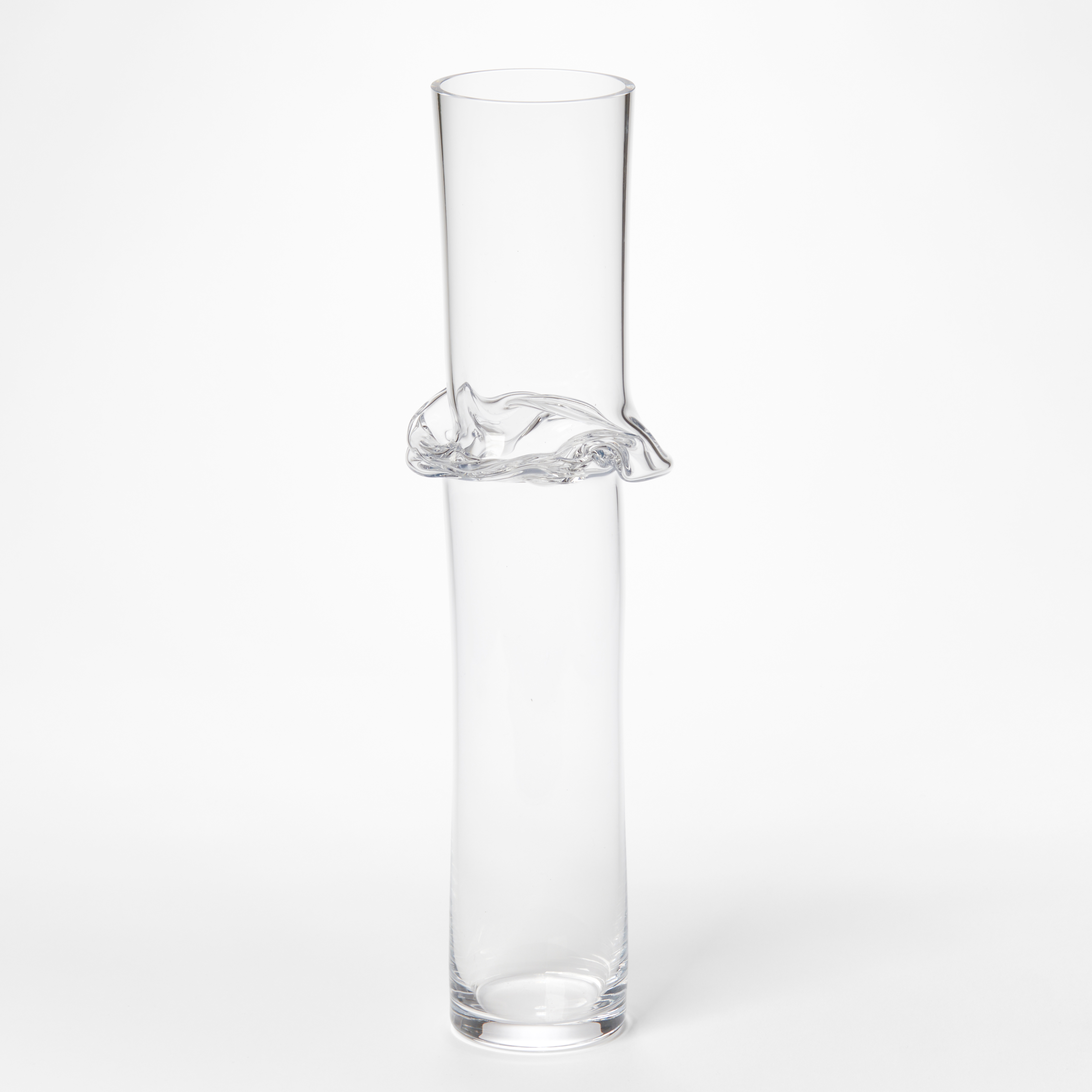 tall uneven clear cylindrical sculpture with flared and rippling waisted joint section hand blown from glass