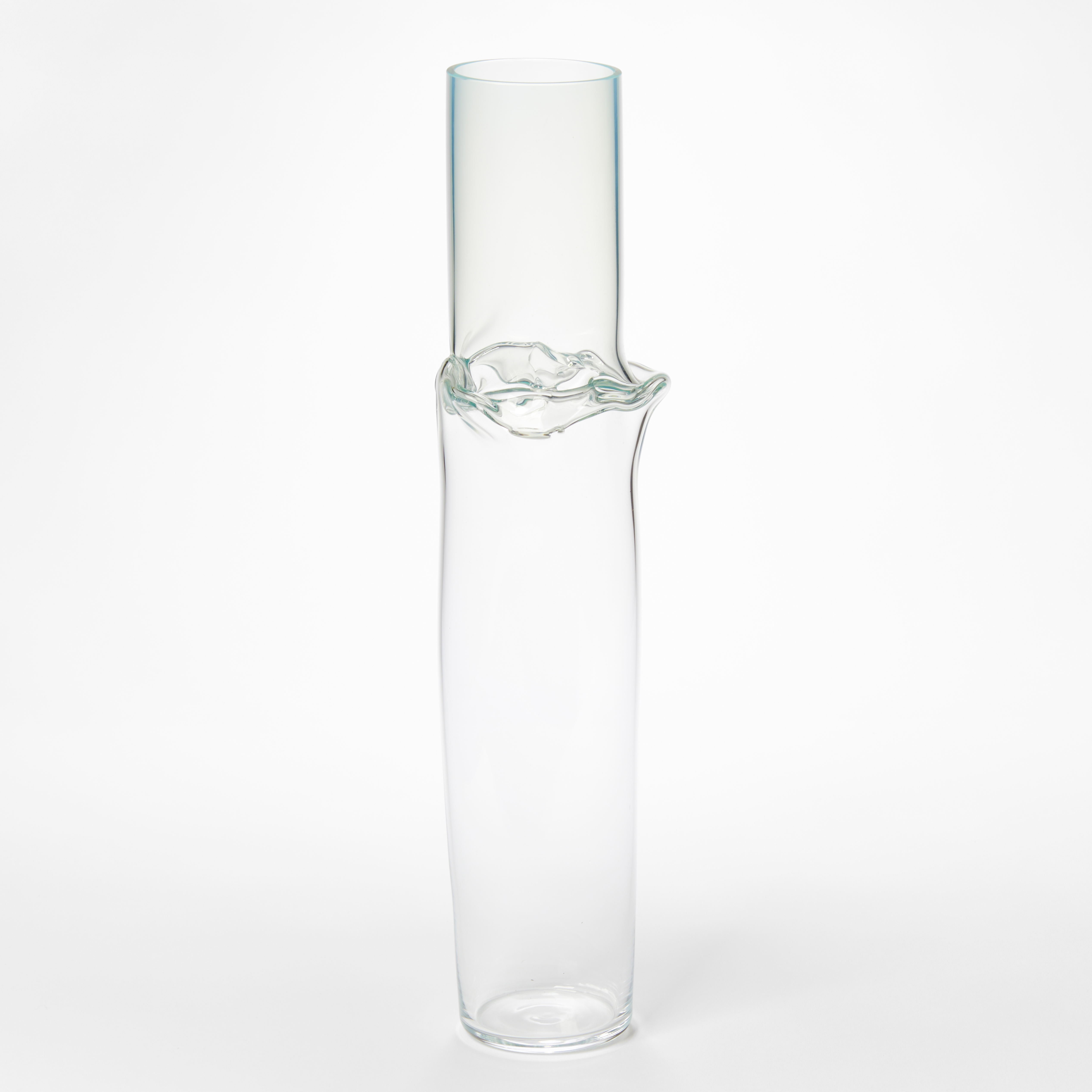 soft transparent cylinder with a hint of light green colouring with a jointed banded rippling section a third from the top rim