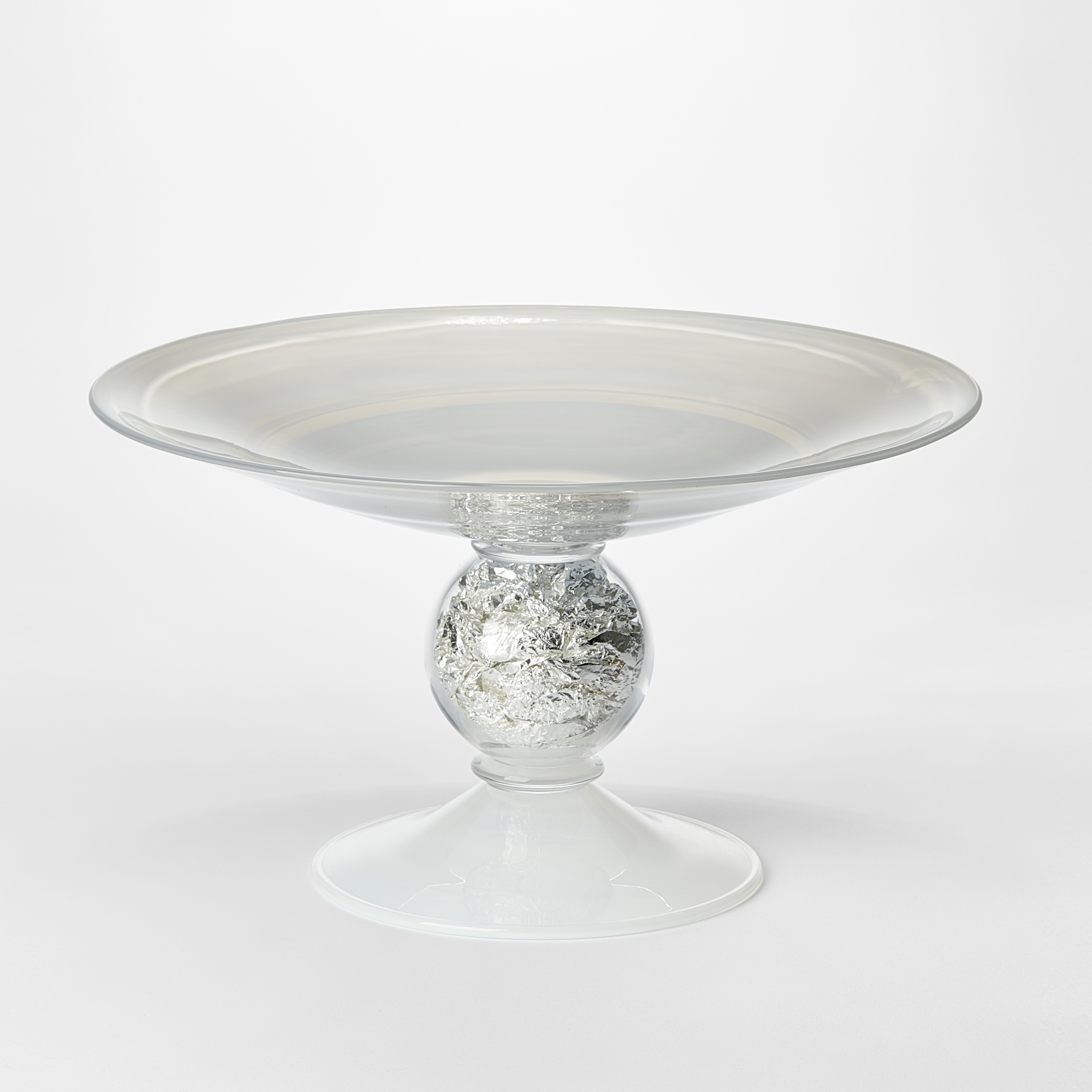 clear and milky white venetian inspired centrepiece with flared top and centre stem filled with silver leaf handblown from glass