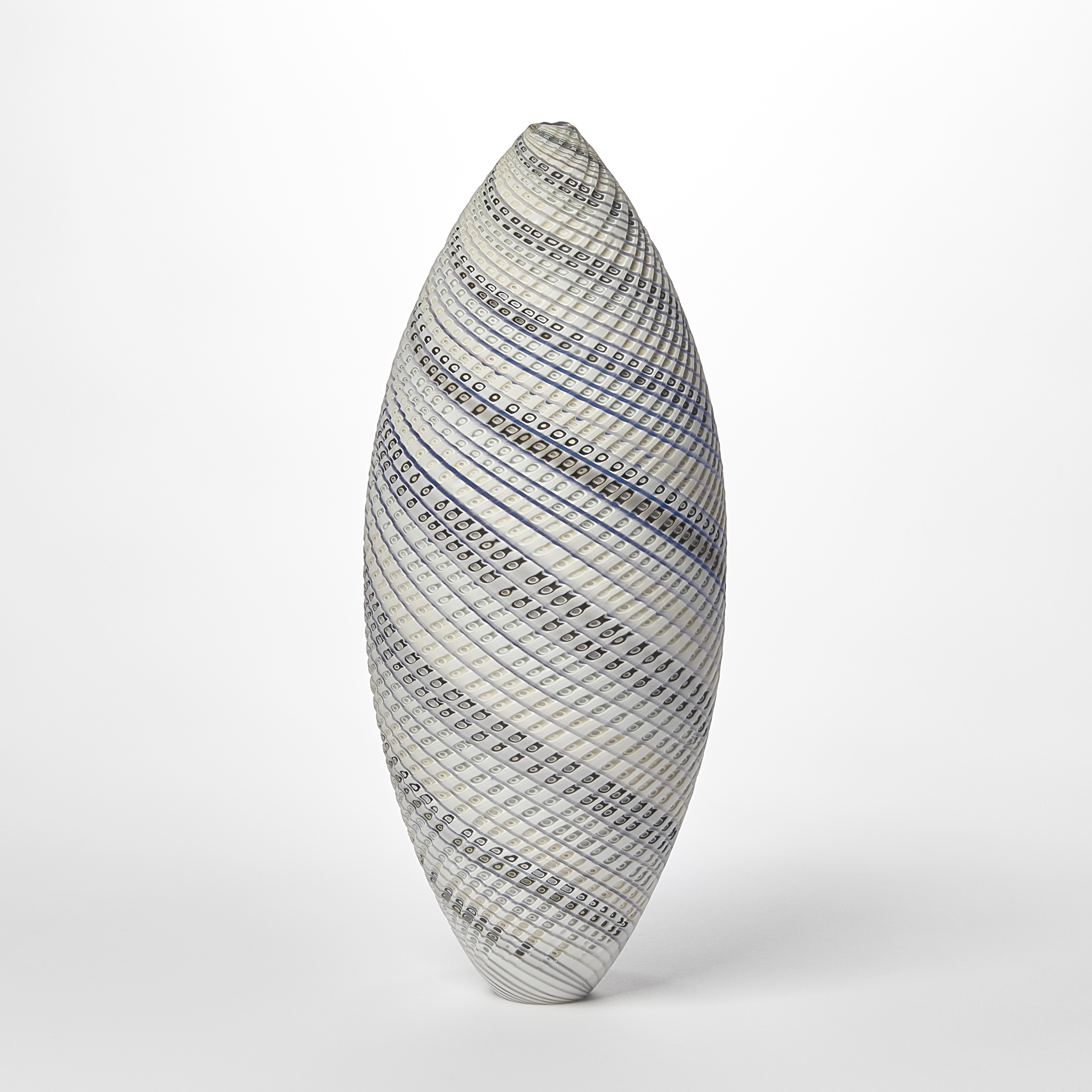 tall standing ovoid vessel with small opening at the top and curling lines round the form in white grey and soft blue with textured cut surface hand made from glass