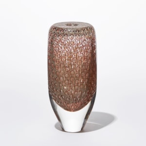 transparent tall round vessel with flat top and small aperture opening with fine repeat surface pattern in aubergine salmon and warm yellow hand made from glass