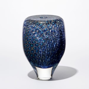 transparent rounded vessel with tapered base with flat top and central opening covered in an intense detailed pattern in rich blue turquoise and aquamarine hand made from glass