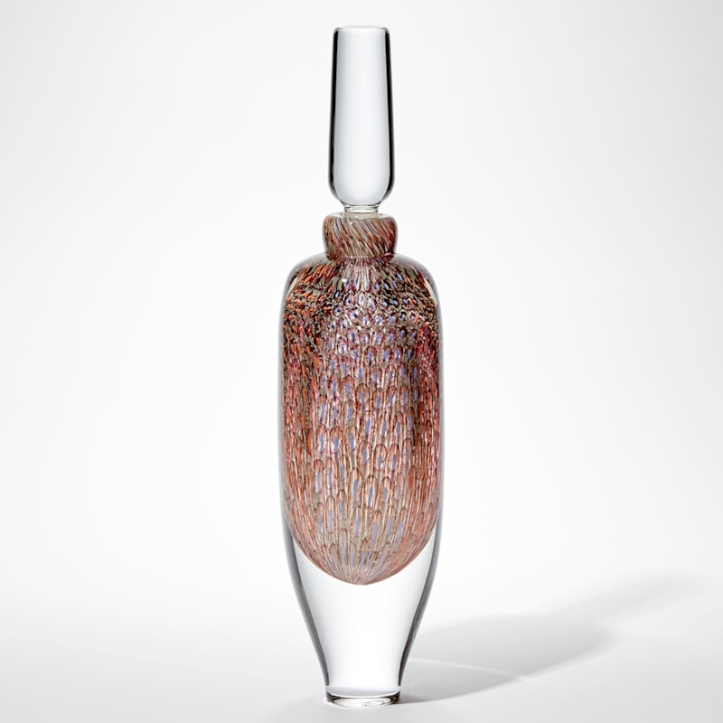 tall clear glass bottle with clear stopper and tapered clear base with trapped internally intense detailed repeat pattern in pale blue coral and soft orange