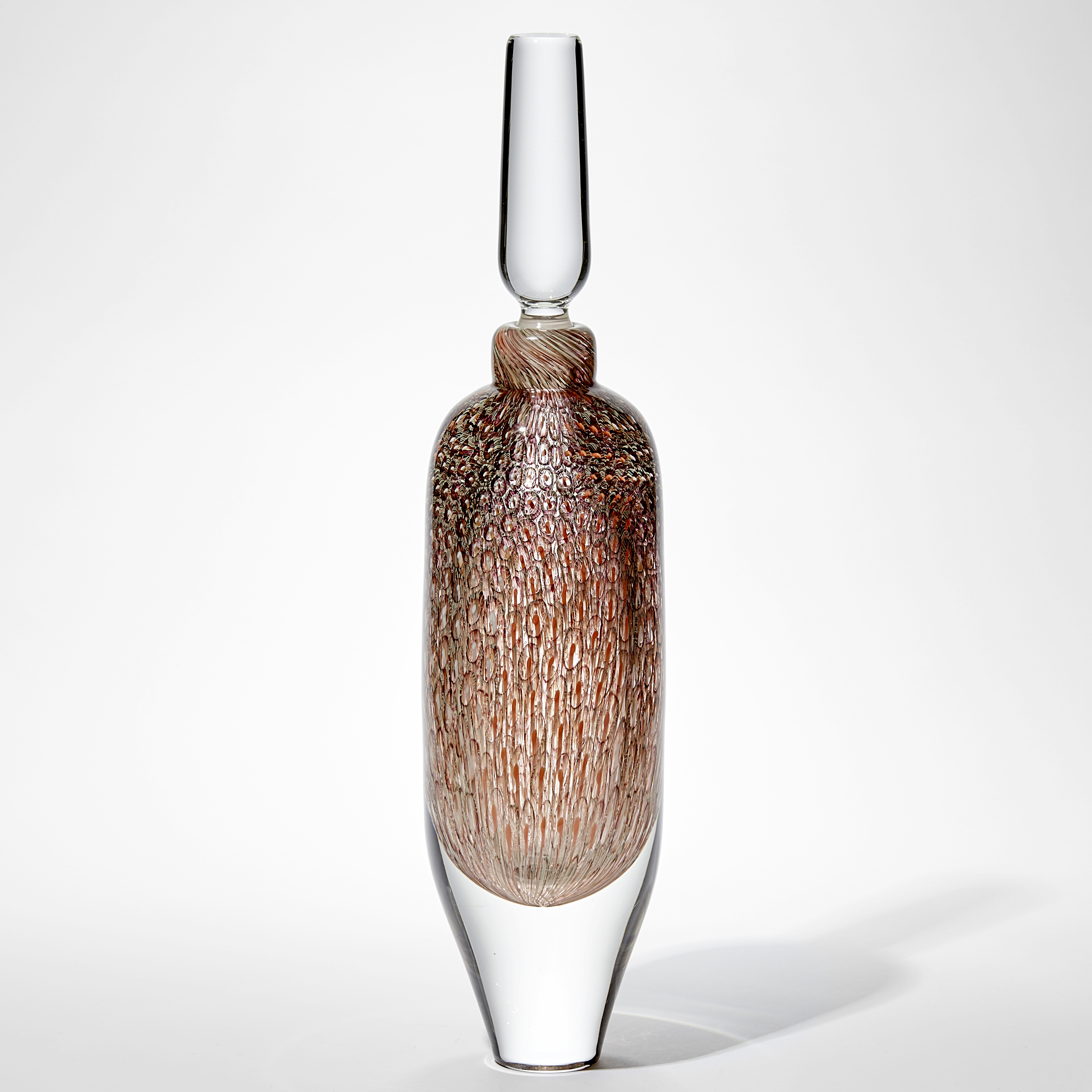 large clear heavy and chunky tall round bottle with stopper and intense repeated surface patter in salmon coral soft yellow and orange