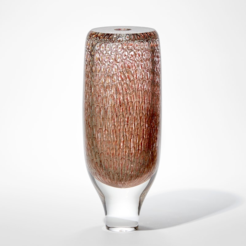 tall round clear chunky and heavy hand made glass vase with tapering base and flat top with intense detailed pattern trapped within in peach salmon coral and soft yellow