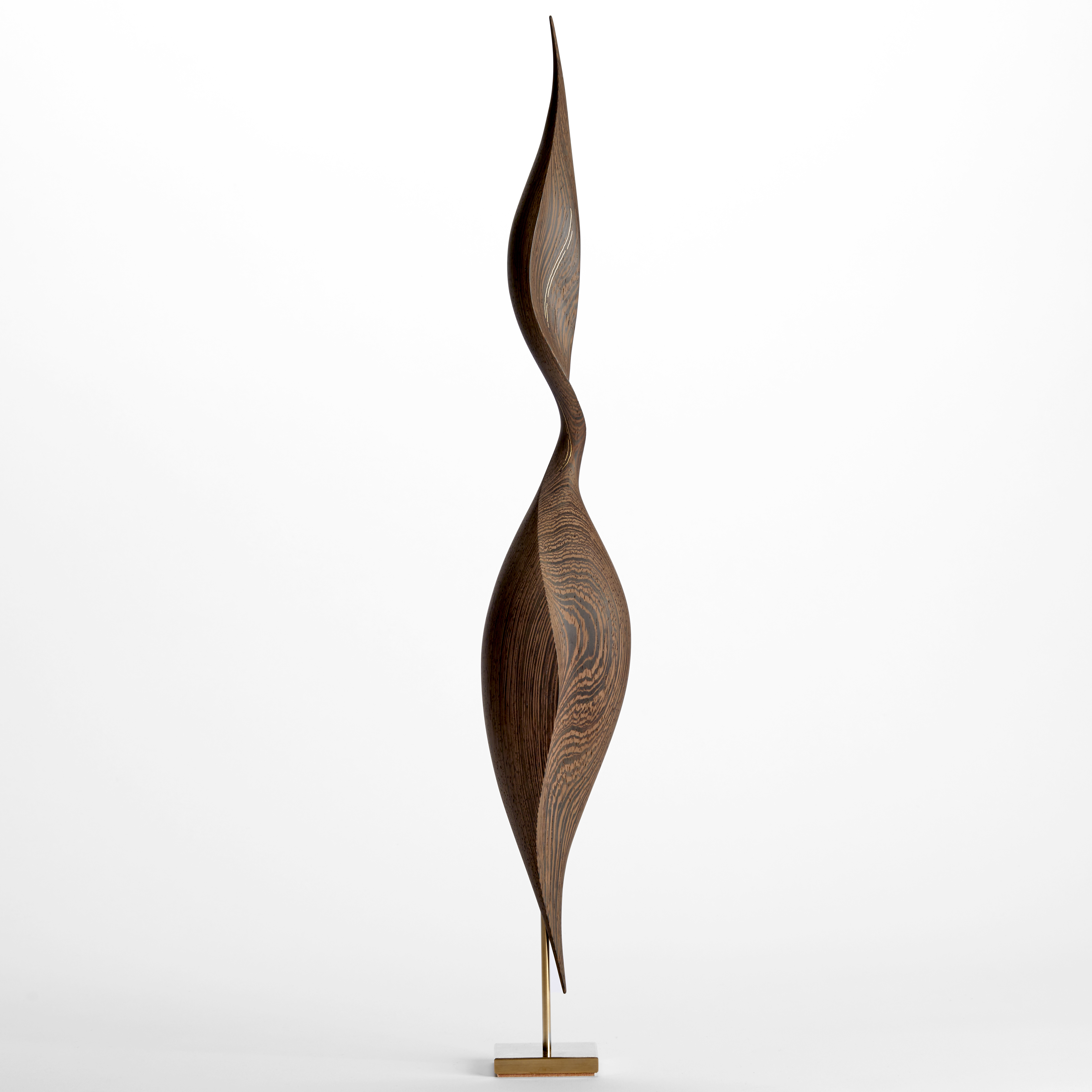 rich dark wenge wood sculpture with swirling dark wood grain and the appearance of an elegant brancusi inspired sleek upright stylised bird with inlaid gold detail and gold plated stand 