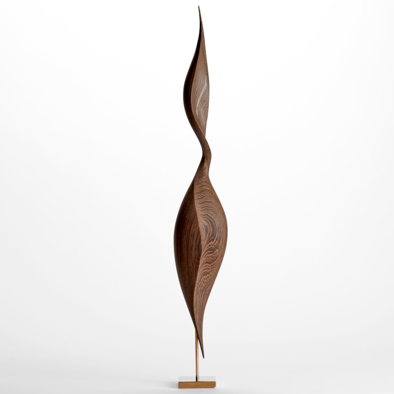 rich dark wenge wood sculpture with swirling dark wood grain and the appearance of an elegant brancusi inspired sleek upright stylised bird with inlaid gold detail and gold plated stand