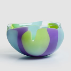 abstract amorphic hand made clear glass centrepiece with chunky soft curved bands of colour in opaque lime purple and dove blue