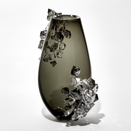 transparent black grey teardrop shaped vase with two sections densely covered in clear and grey crystals with ink swirls trapped within hand made from glass