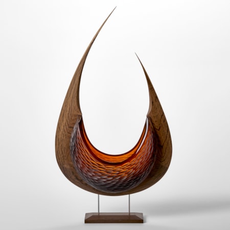 stylised viking ship with curved oak hull and two sections of rich dark amber textured hand blown glass held aloft on a stainless steel and wood base