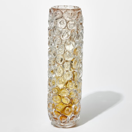 cylindrical transparent tall vase with dark amber base fading to clear at the top with the outer surface covered in enlarged bubbles just like bubblewrap hand made from glass