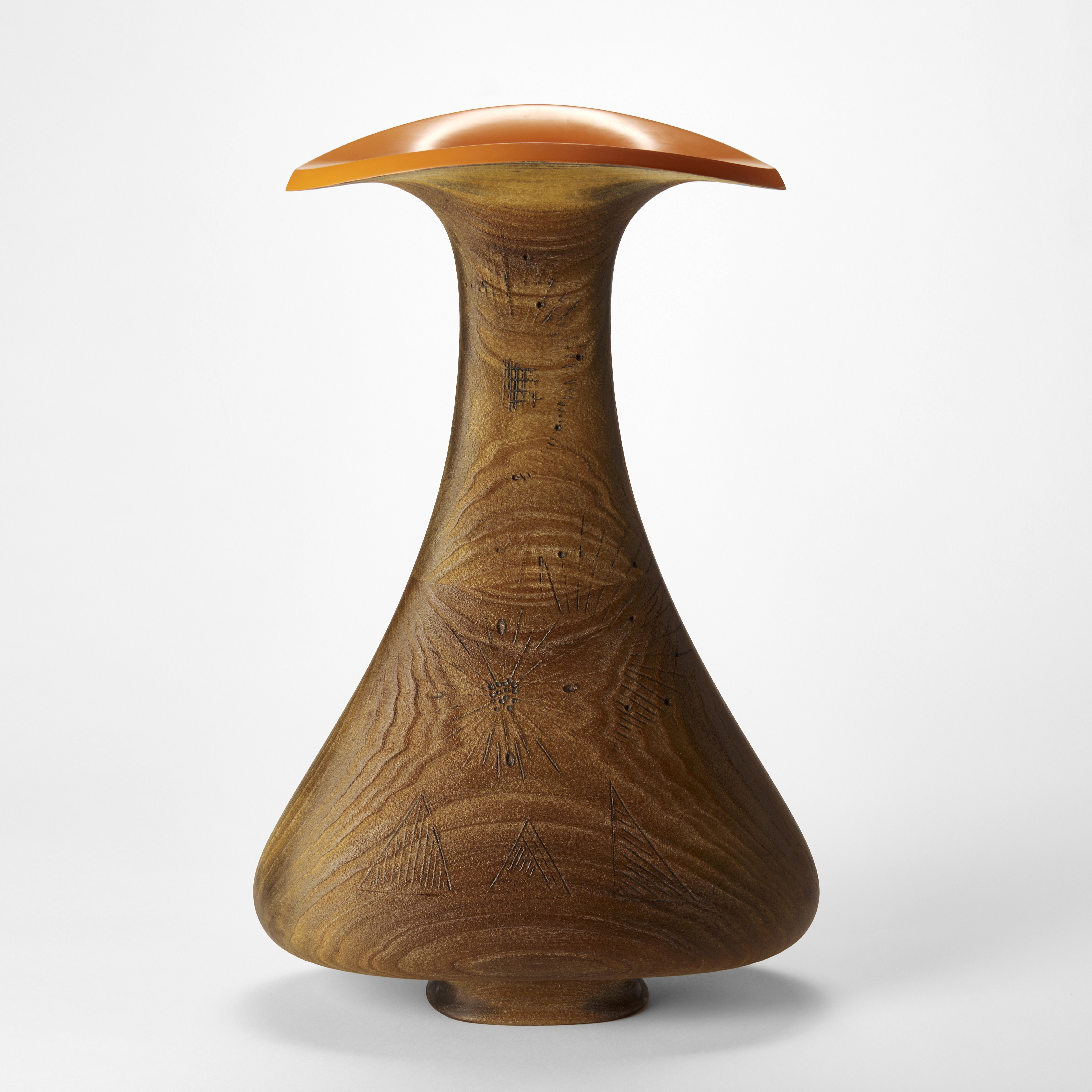 wide based soft triangular rounded sides wooden vessel with flared top opening with bright orange interior and with the outer surface covered in abstract weather worn markings