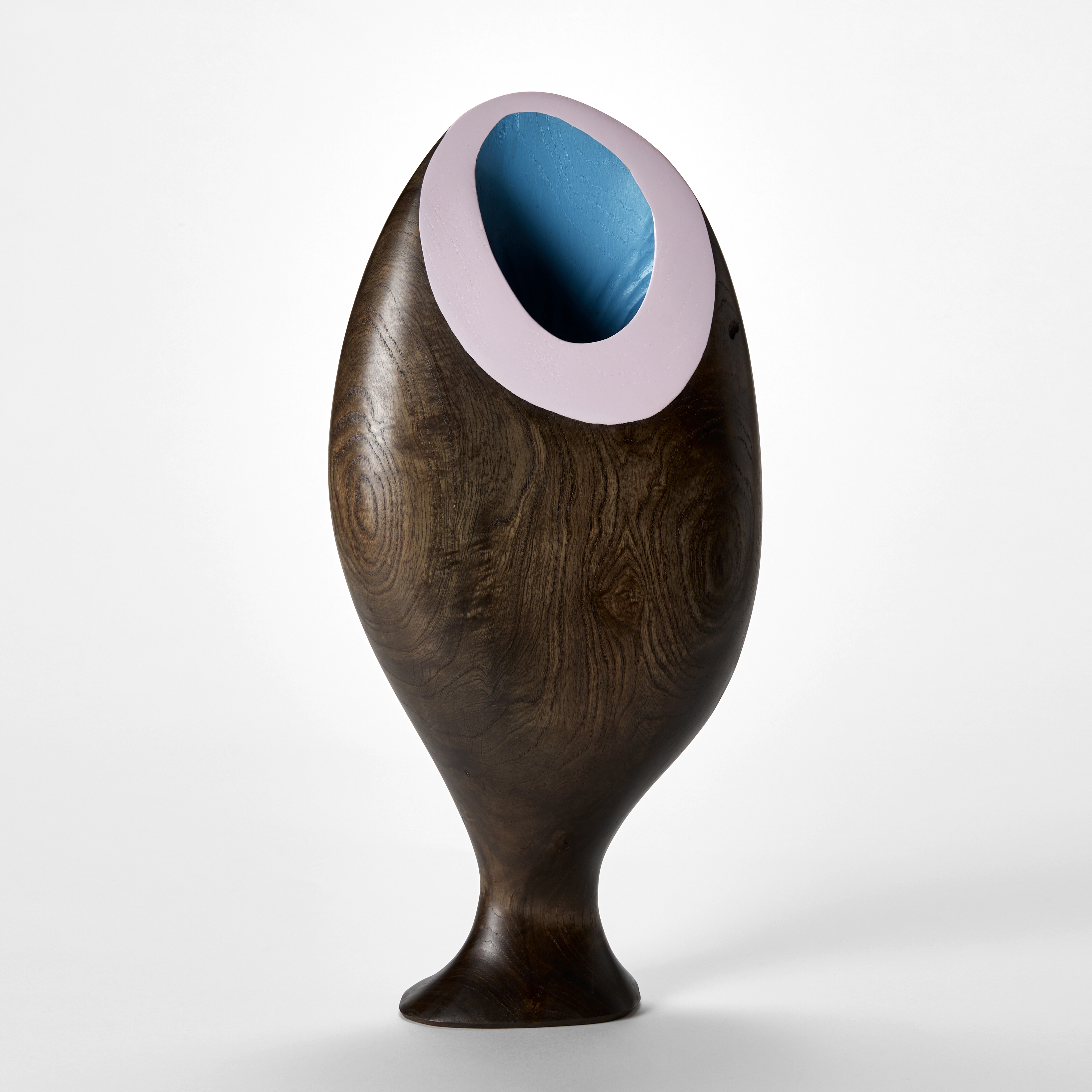 tall flat ovoid shaped sculptural vessel with flared foot hand made from ash with a wide angled flat opening with a soft pink rim and turquoise interior
