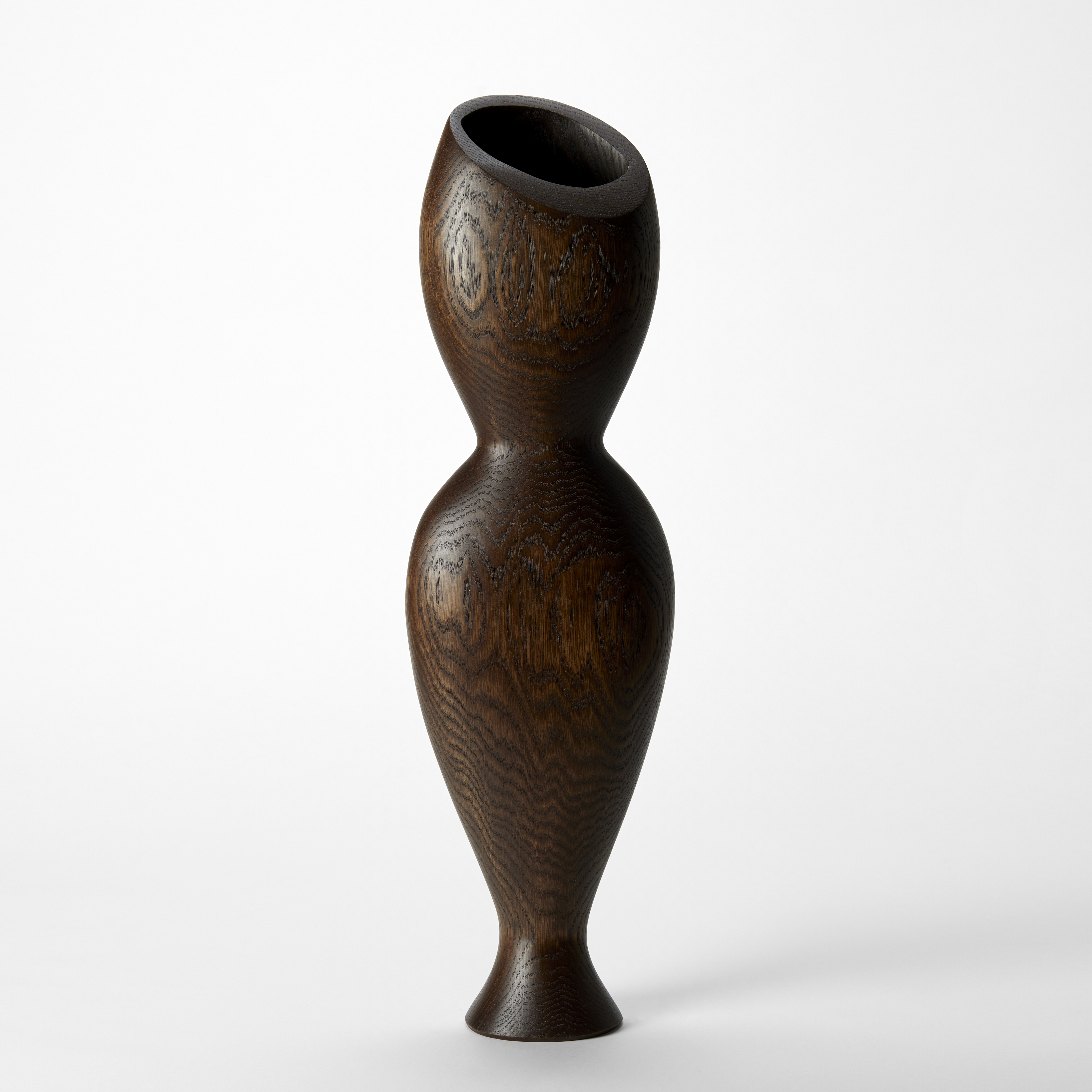 tall hour glass curved standing abstract figurative sculpture with tapered elegant food hand made from oak with a top angled wide opening