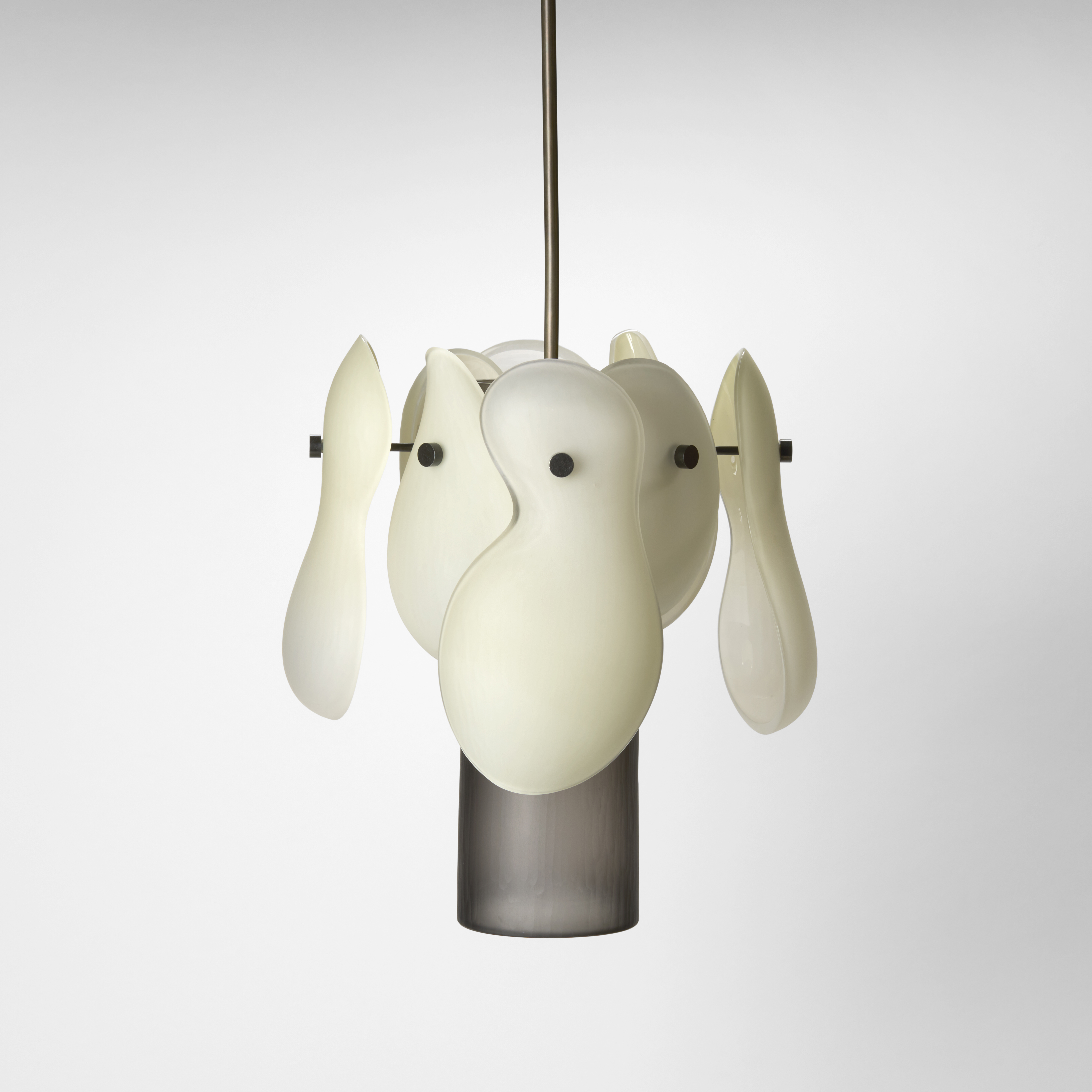 opaque pendant light with a central tube in opaque grey with 8 suspended petals in alabaster white hanging down from the top edge in two rings around the central section each with a distorted figure of eight profile hand made from blown and cut glass