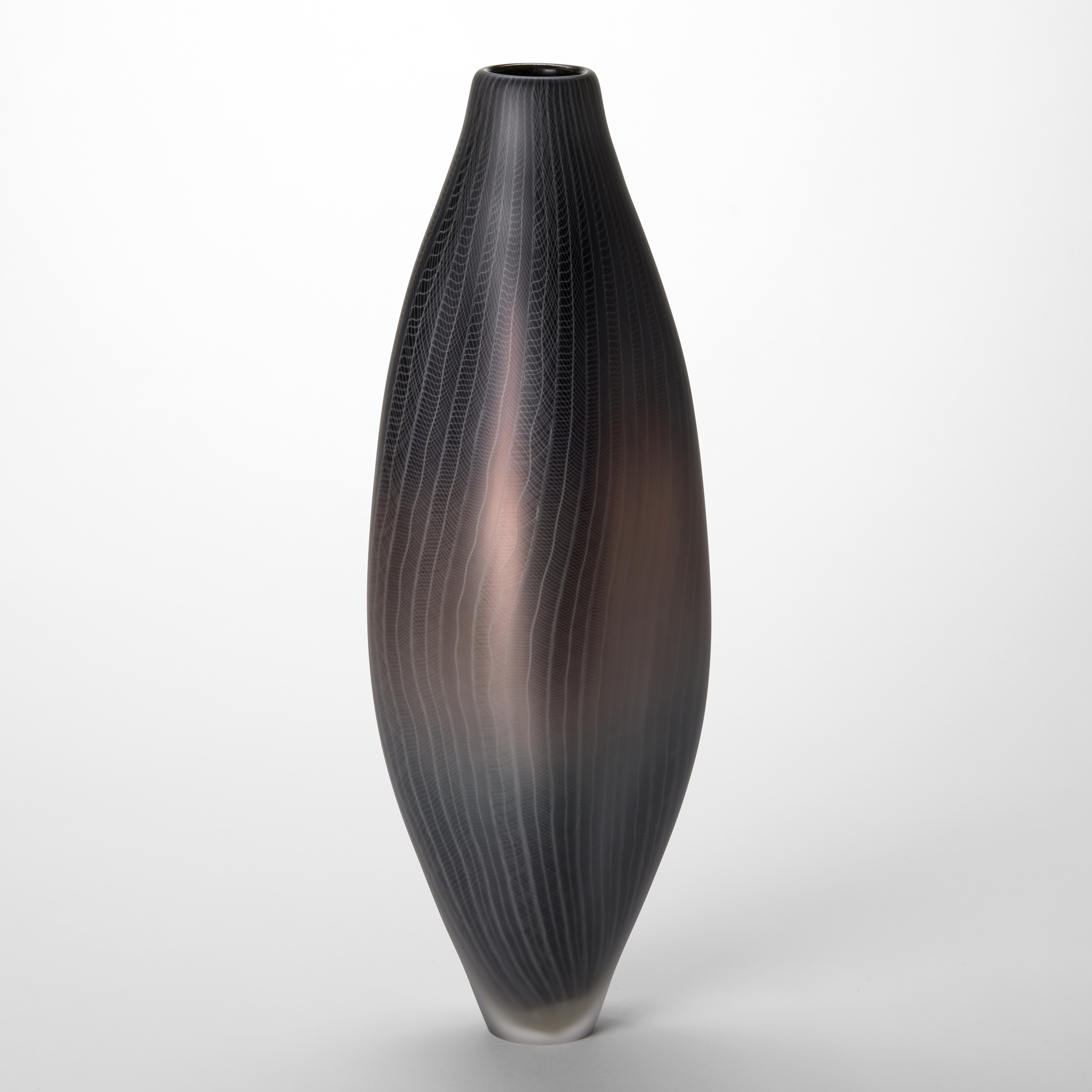 tall lozenge shaped vessel with narrow foot and small top opening in soft satin metallic aubergine bronze and grey with a fine white line pattern on the surface hand made from glass