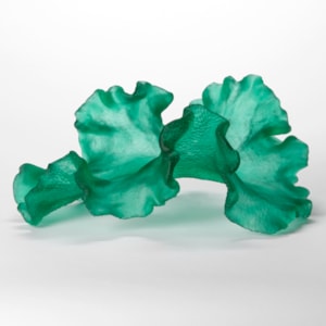 opaque dappled soft emerald green organic sculpture with the appearance of a floating piece of seaweed with frilled undulating edges and a finely scolloped textured underside hand made from glass