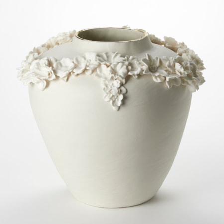 elegant off white cream rounded vase with tapering lower half and slightly raised narrowing rim on the top finished with a band of gold with the widest section encircled with a looping band of protruding flowers hand made from porcelain
