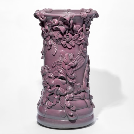 tall architectural column shaped vase with swirls and flourishes attached and encircling the exterior hand thrown from white saint thomas clay with a soft satin sheen rich dark pink glaze