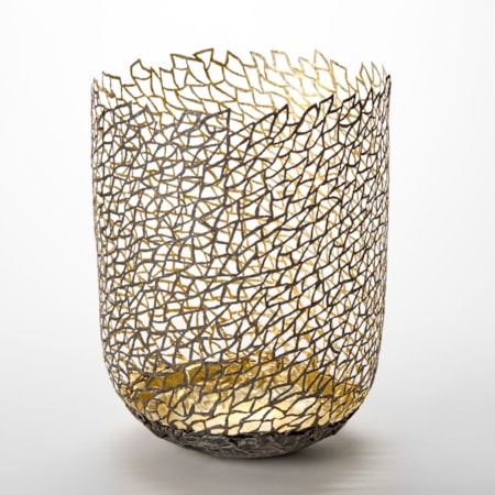 standing column shaped vessel with rounded base and organic lattice pattern perforating the entire side hand made from darkened steel and twenty four carat gold leaf