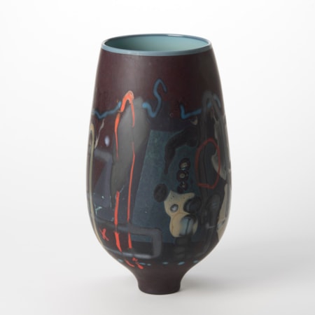 tall opaque dark purple aubergine vase with a glossy teal blue interior and exterior covered in abstract lines and patterns in red midnight blue grey and ochre hand blown from glass