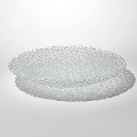 low wide transparent centrepiece bowl created from stacked clear rods creating a lattice pattern hand made from fused glass