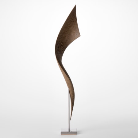 simple stainless steel base holding above a tall winding and widening ribbon of curing wood hand sculpted from wenge