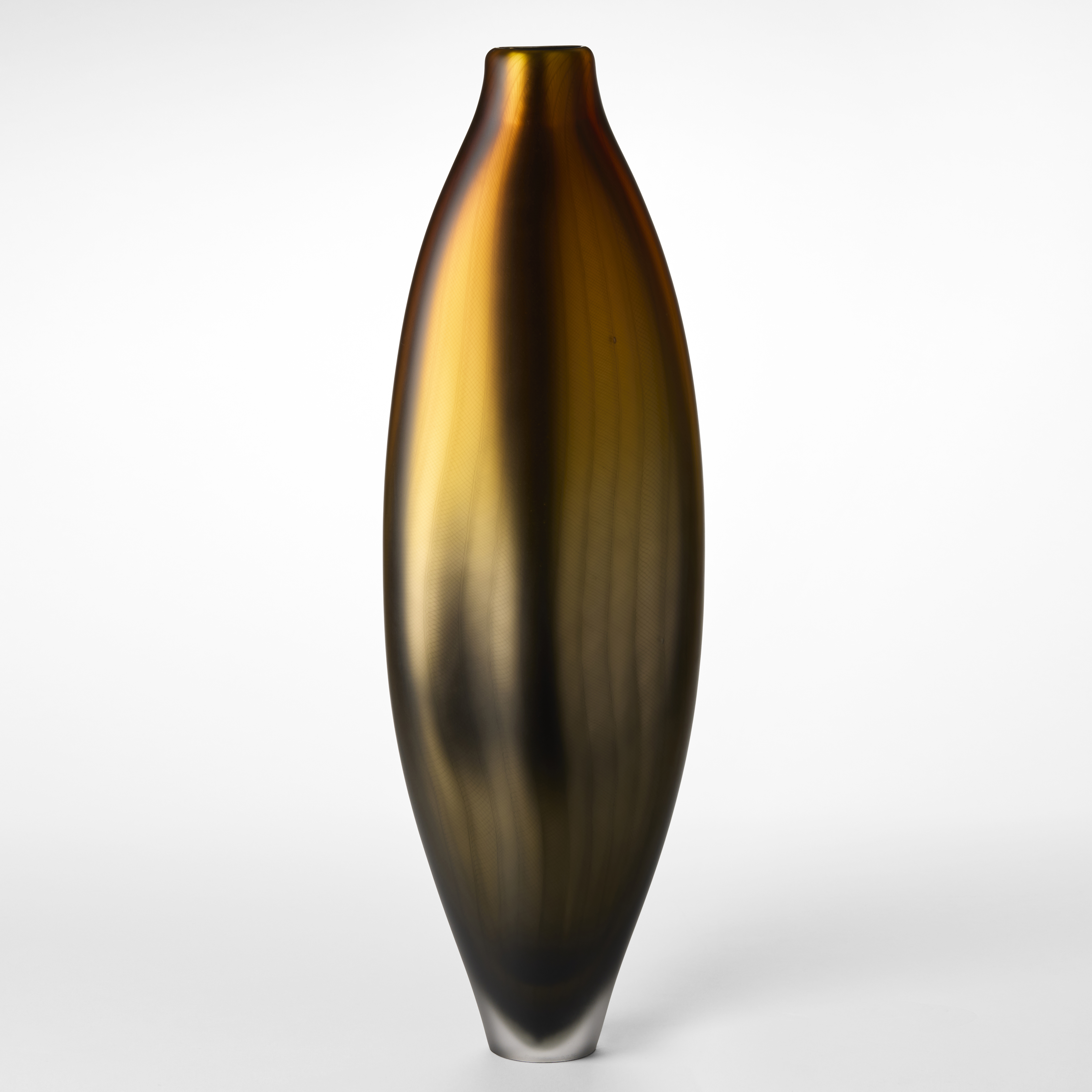 tall soft lozenge shaped vase with a satin metallic surface merging from bronze at the base to gold at the top with a fine lattice line pattern on the top hand made from blown glass