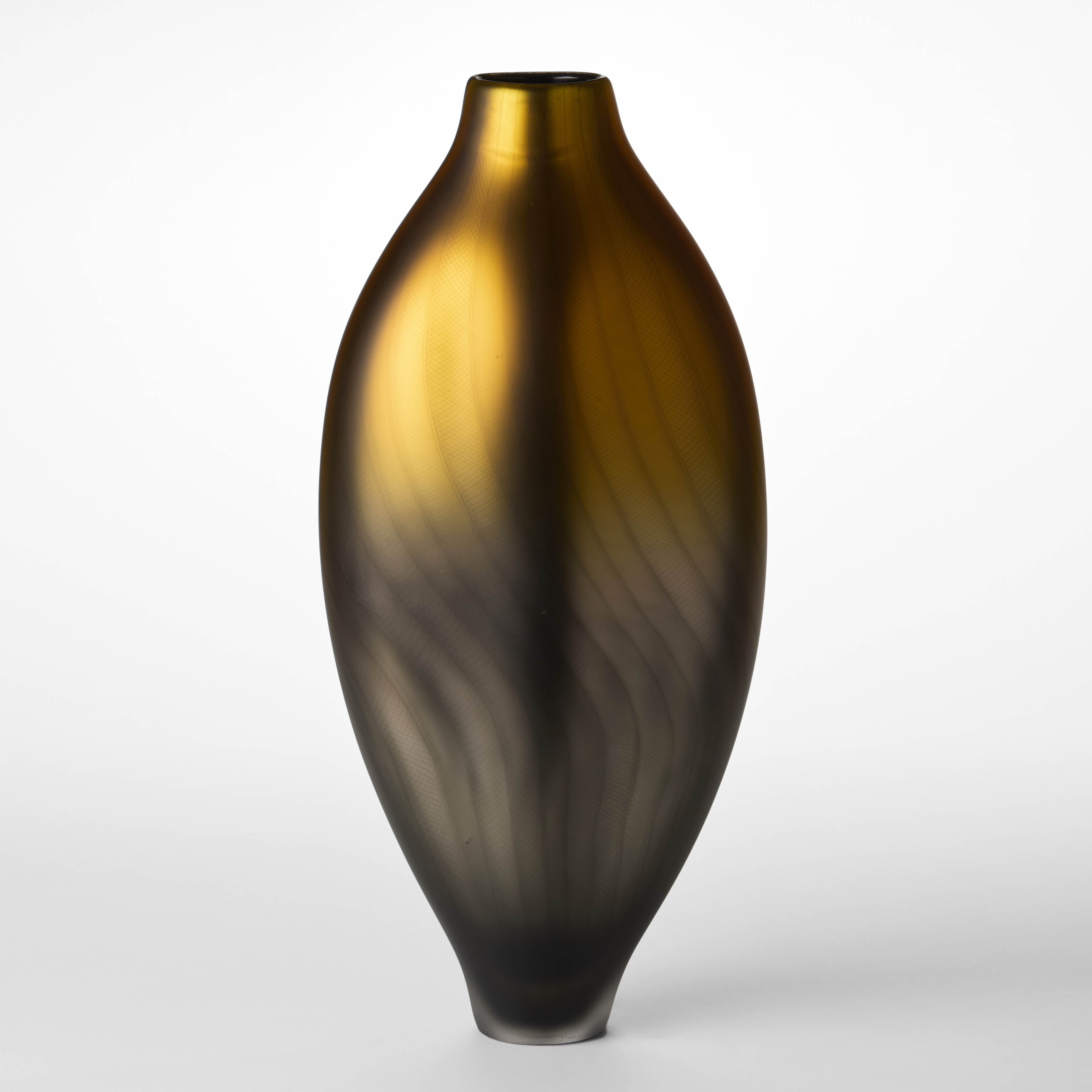 tall elegant vase with a sleek silhouette and satin finish featuring a gradient from golden amber to dark brown at the base with a fine wavy top lined pattern on the surface hand made from blown glass