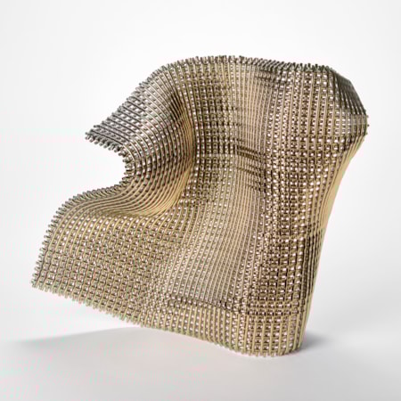 a sculptural artwork made of a grid like structure of glass rods forming a flexible wave like shape that looks as though fabric is frozen mid motion with a shimmering and reflective surface and a complex geometric lattice texture hand made from glass and gold