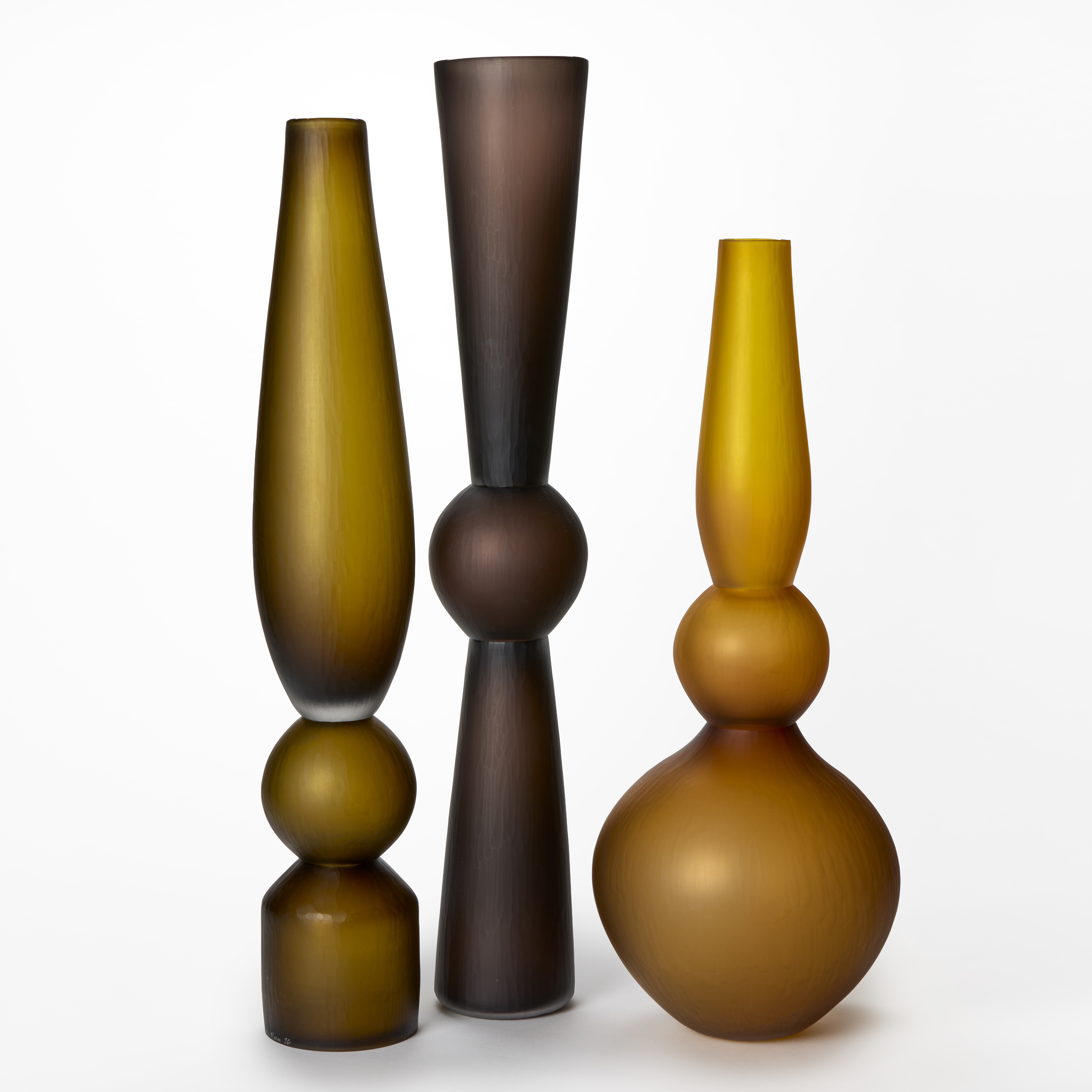 selection of tall minimalist blown glass vases in different colours