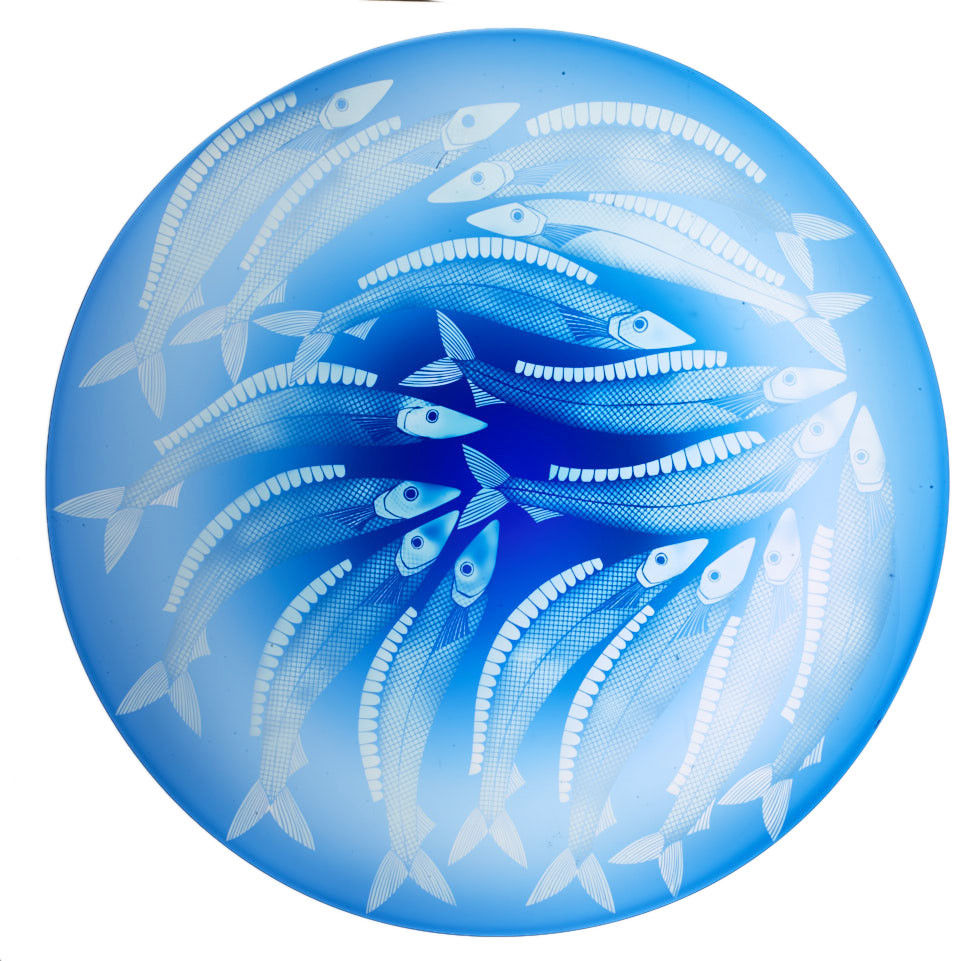 blue glass plate ornament with wihte fish decoration