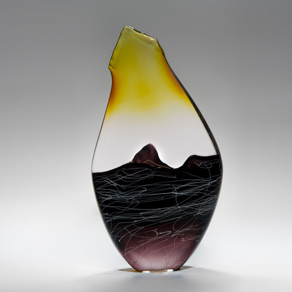 modern blown glass sculpture in yellow black clear and purple