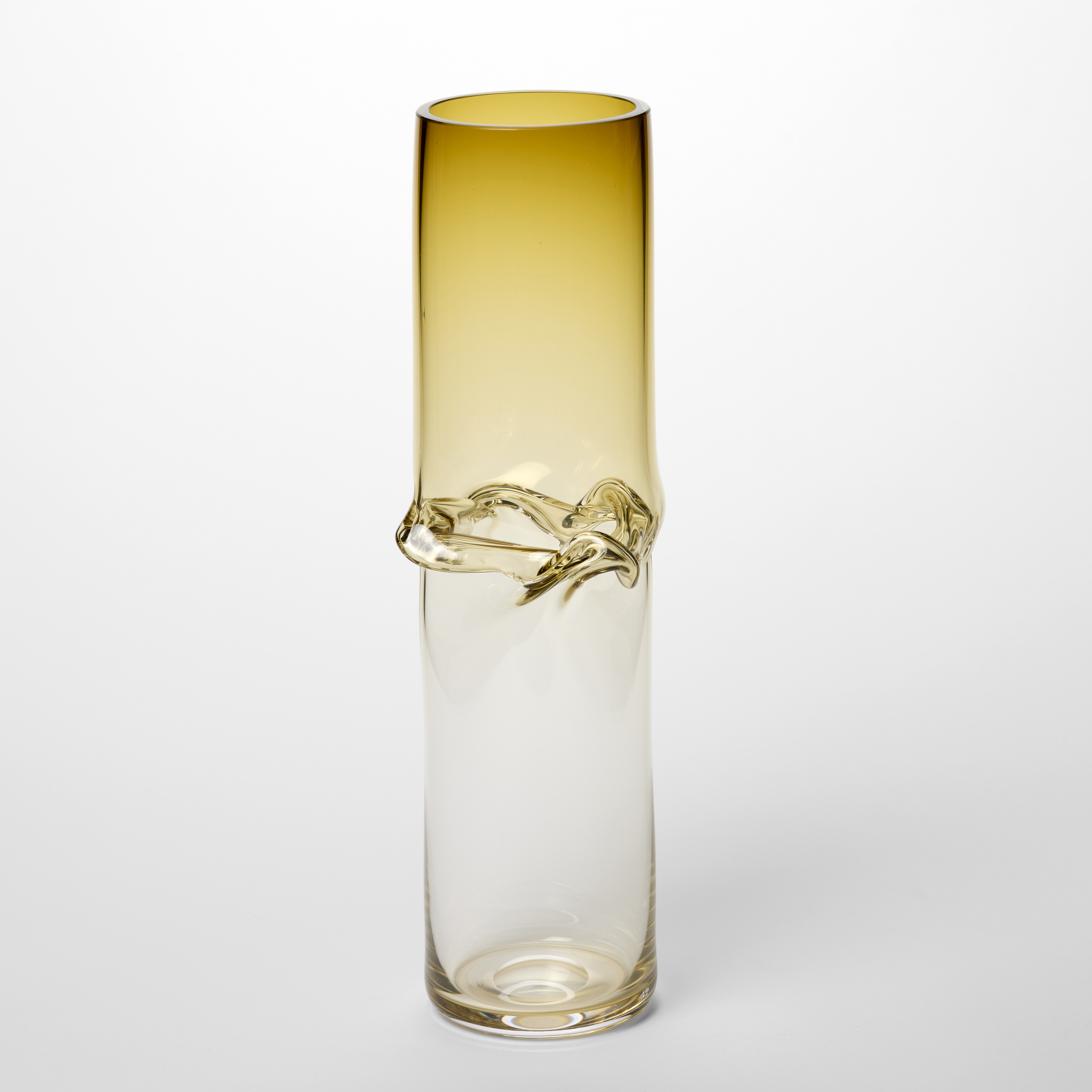 tall cylindrical vessel fading from rich amber at the top to clear at the base with a central creased waisted section hand blown from glass