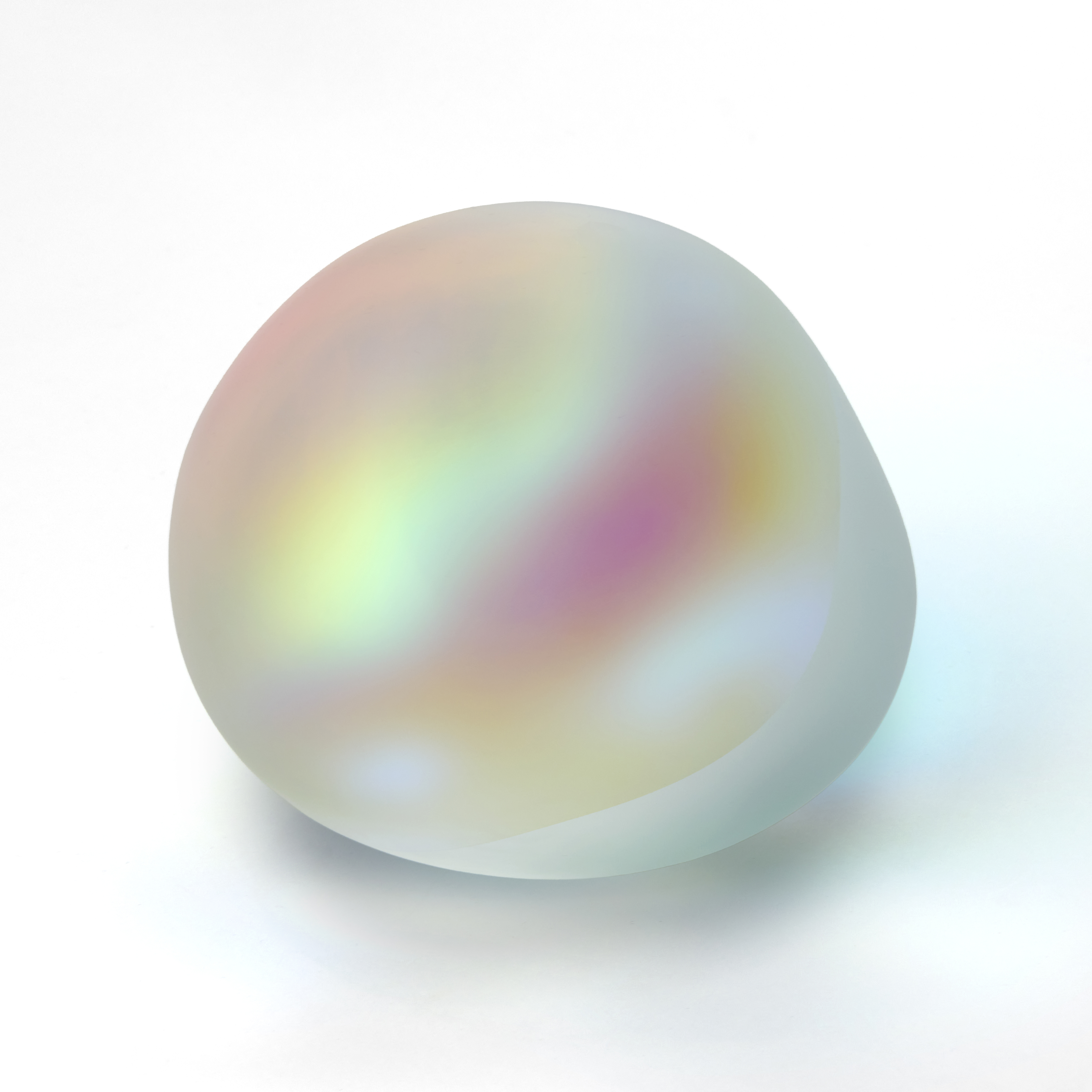 round smooth opaque clear rock with iridescent colours emitting from the inside hand made from glass