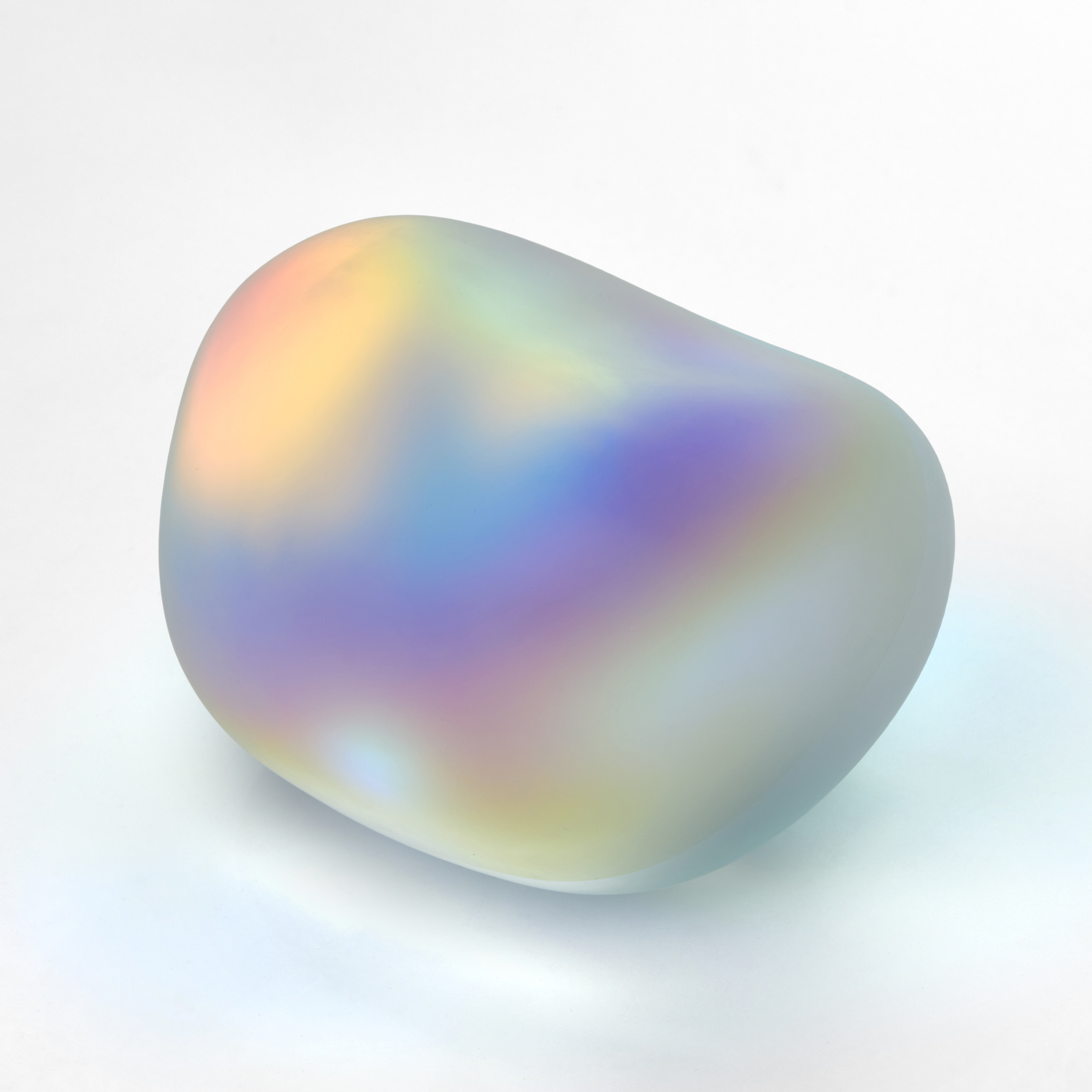 large smooth semi transparent clear rock with iridescent colours glowing from with hand made from glass