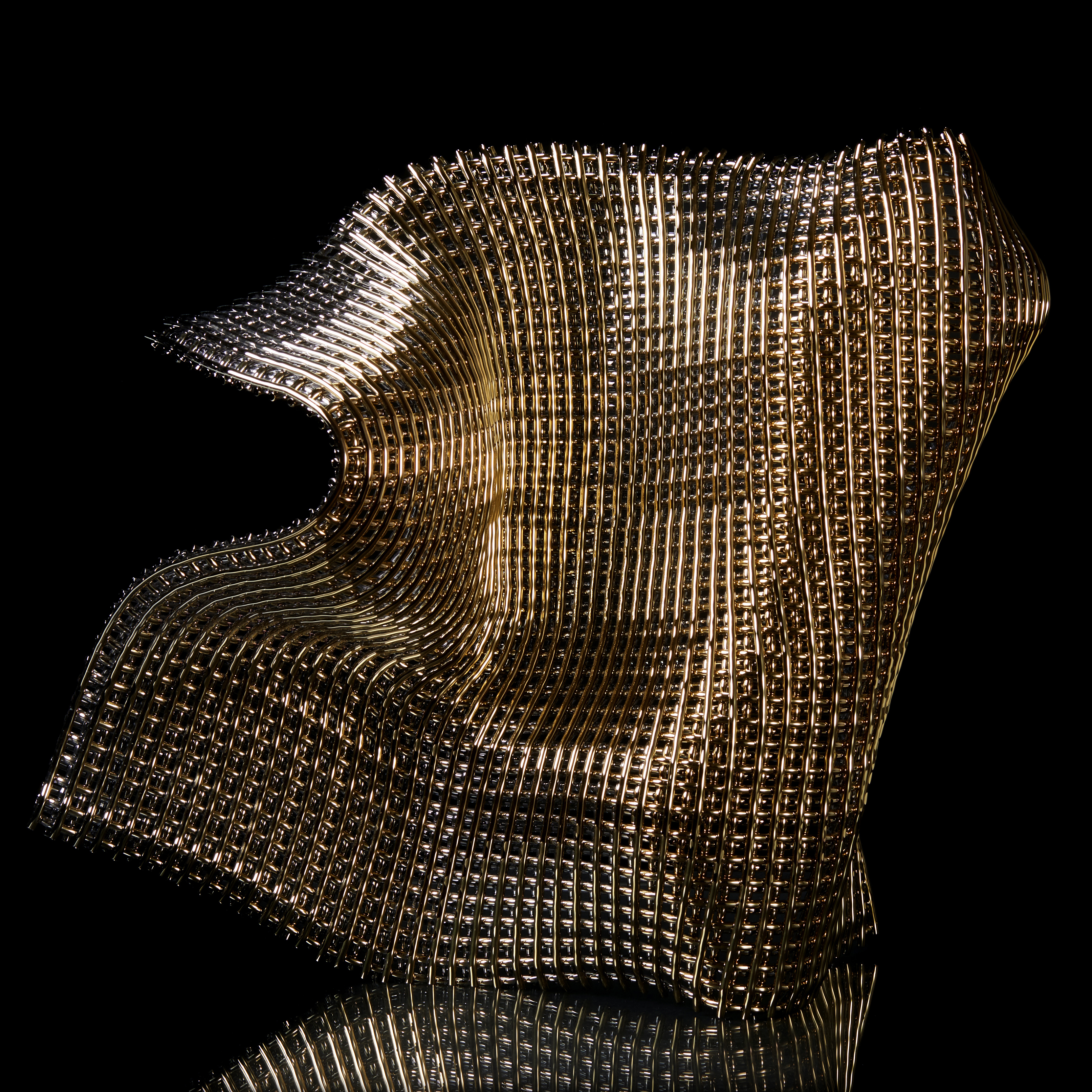 standing undulating and ripping square form with the appearance as if made from interwoven stands of gold but also mimicking the folds and curves of cloth hand made from glass and twenty four carat gold