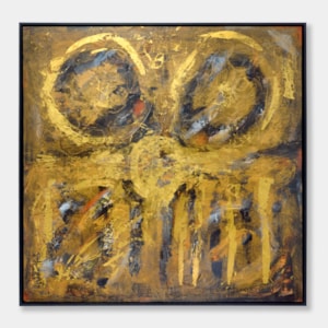 large abstract painting in gold ochre black and orange with circular and linear motifs painted with acrylic paint mounted in a black wooden frame