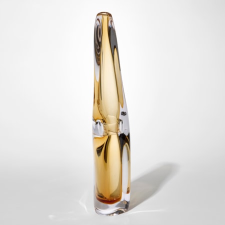 transparent tall fluid vase with thick clear outer layer and inner trapped layer in soft warm yellow with a pinched in section half way up hand blown from glass