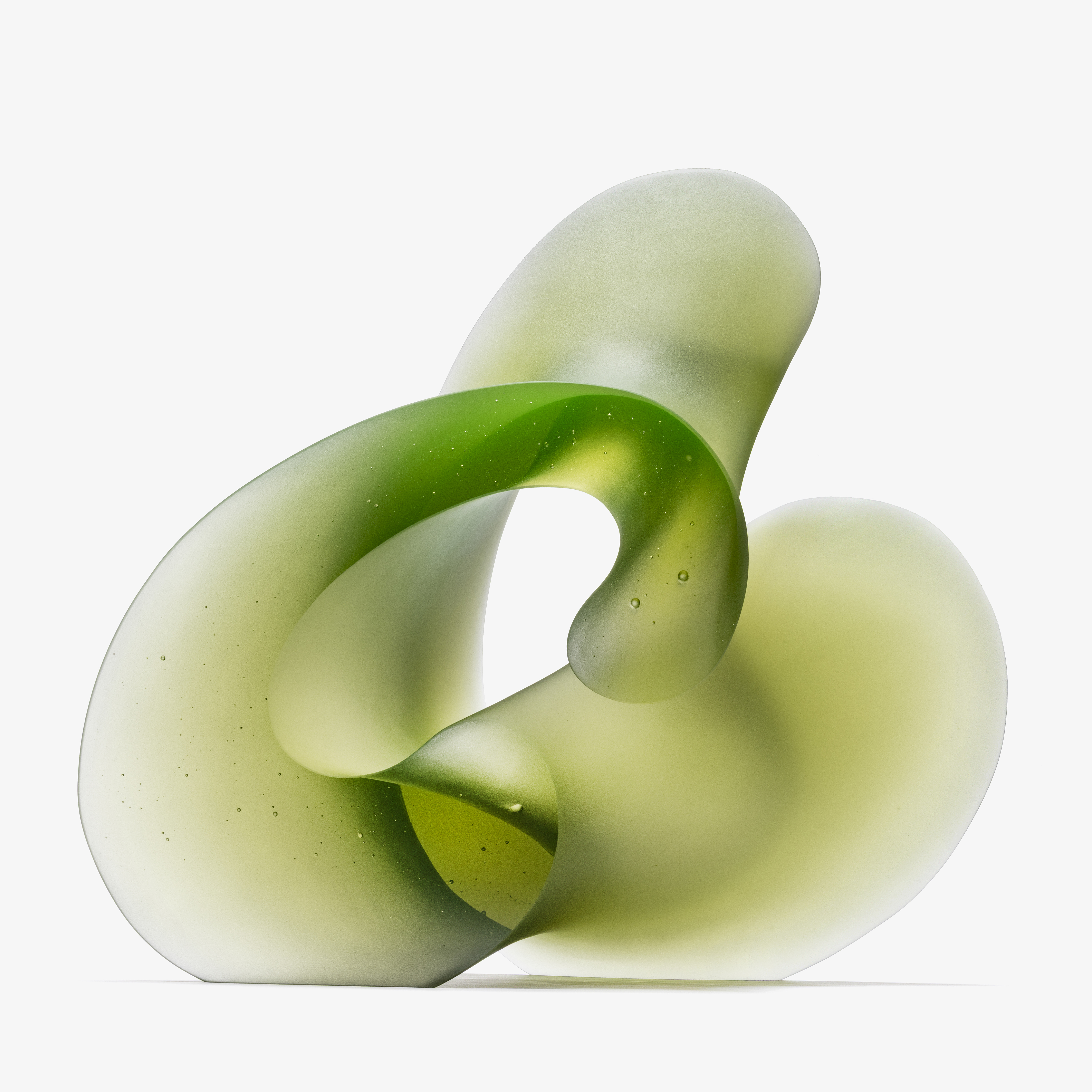 chunky opaque green standing curved and curling form with the appearance of calligraphy and elaborate script hand made and cast from glass 